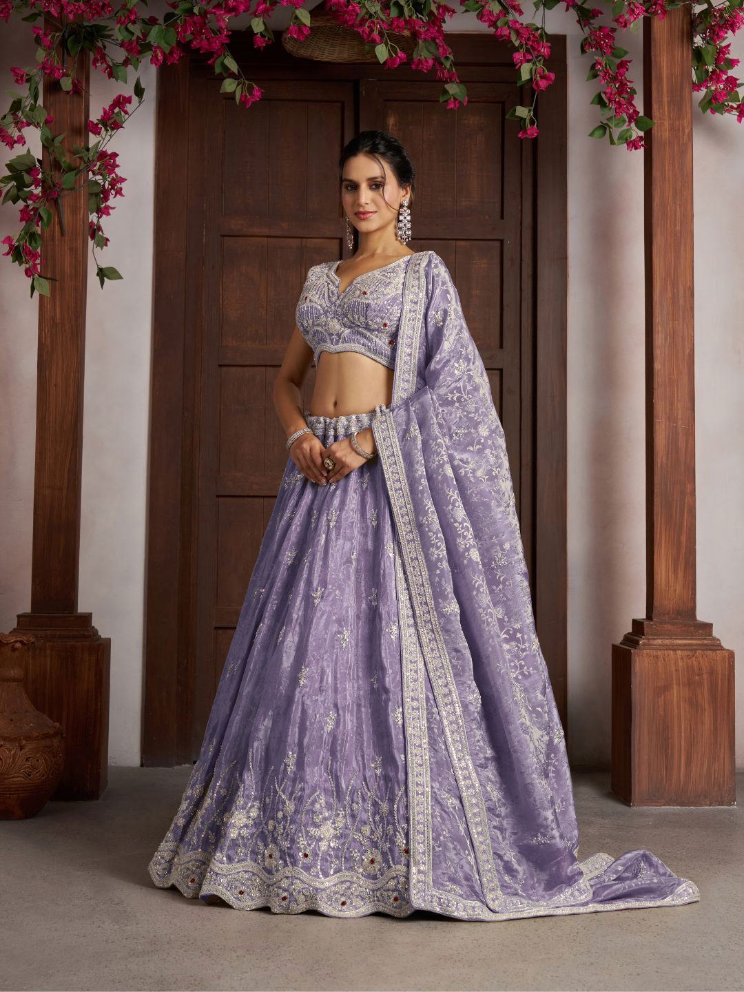 Luxurious Purple Banarasi Tissue Lehenga Adorned with Bead Embellishments