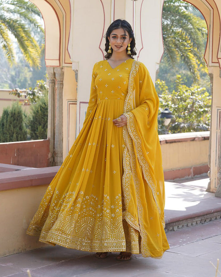 Yellow Color Full Flair Anarkali Gown With Embroidered Dupatta  - By Qivii