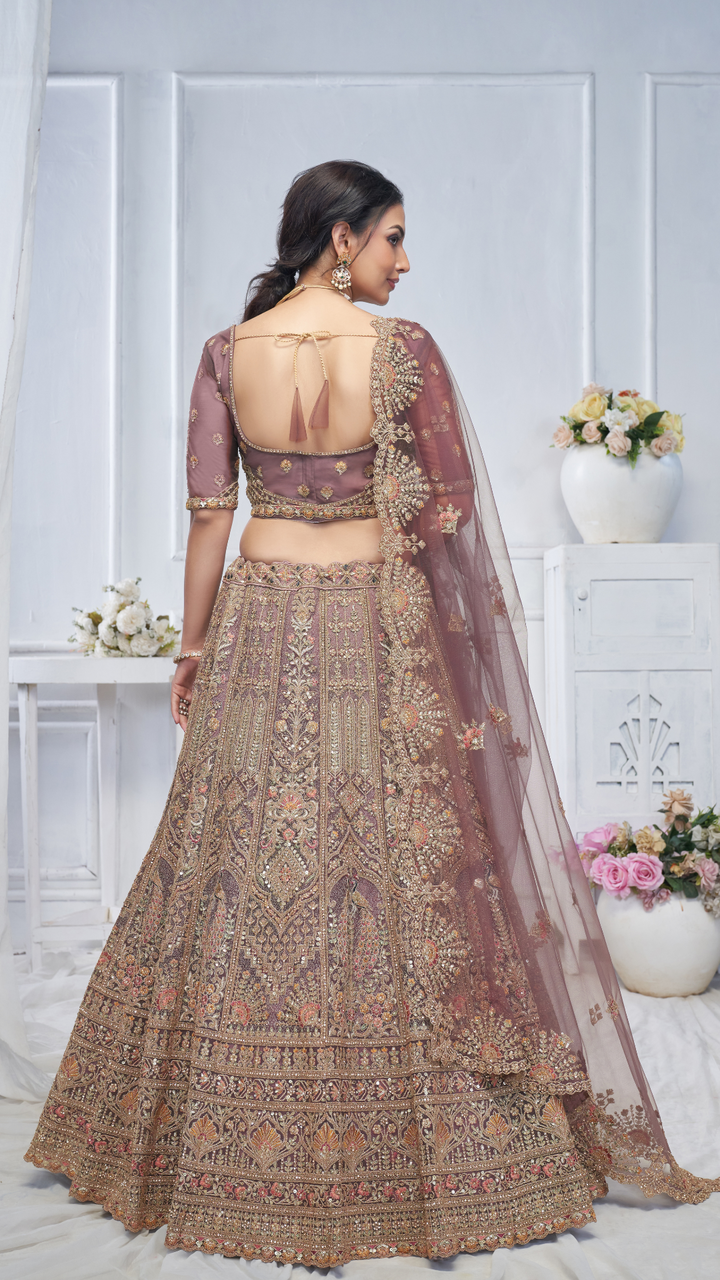 Royal Grandeur bridal  Purple Soft Net Lehenga with Paisley and Peacock Motifs & Heavy Embroidery