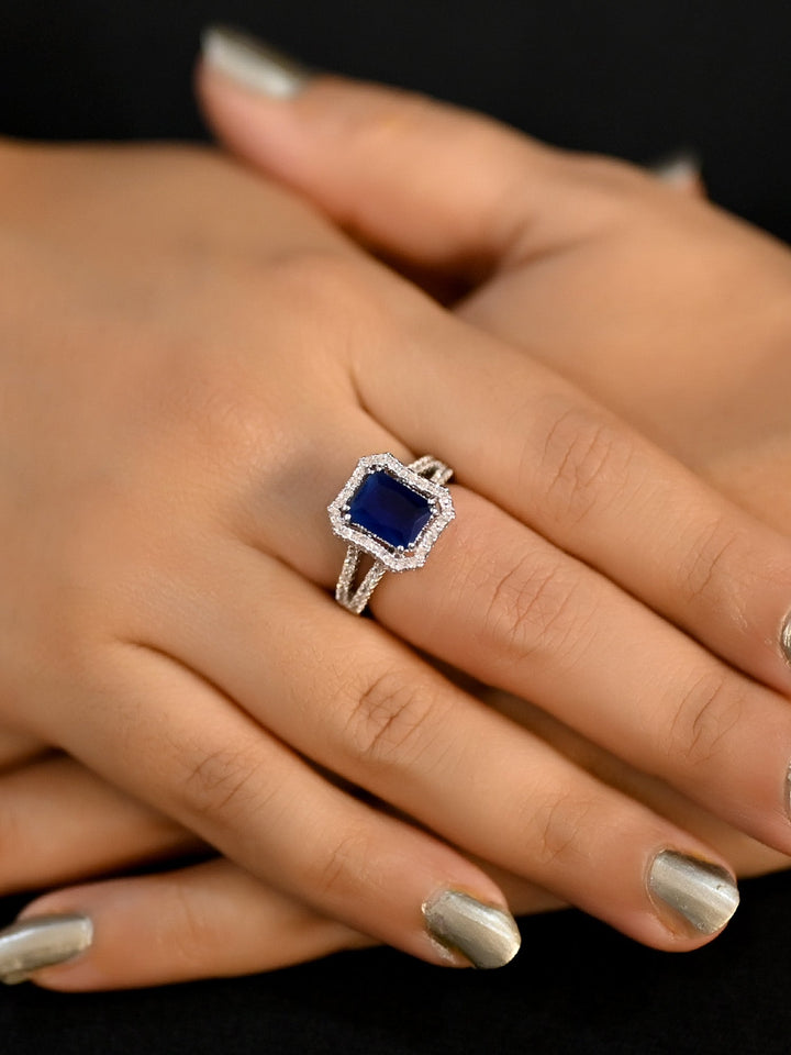 Navy blue American diamond finger ring with intricate silver detailing and elegant design for a stunning and sophisticated look 