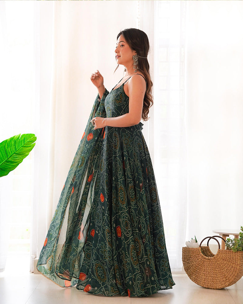 Stylish and graceful dark green color Anarkali gown with floral bandhani print by Qivii