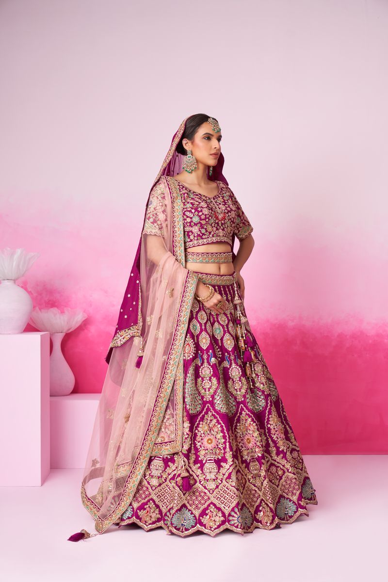 Burgundy pure silk bridal lehenga with intricate moti, sequin, and multicolor thread embroidery