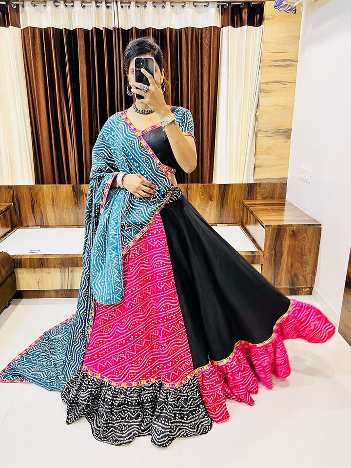 Pink and black color pure cotton silk printed lehenga with Gamthi lacework and mirror work detailing