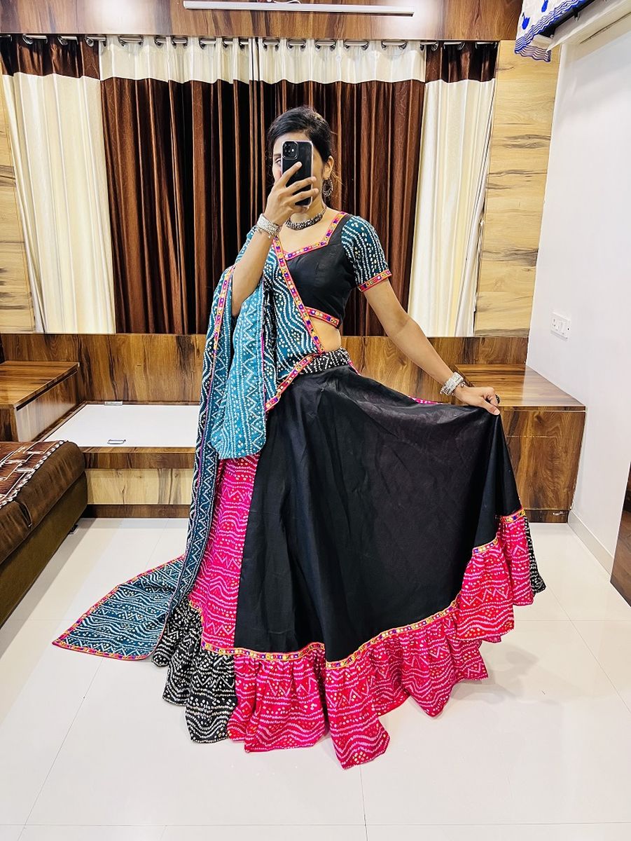 Pink and black color pure cotton silk printed lehenga with intricate Gamthi lacework and mirror work detailing