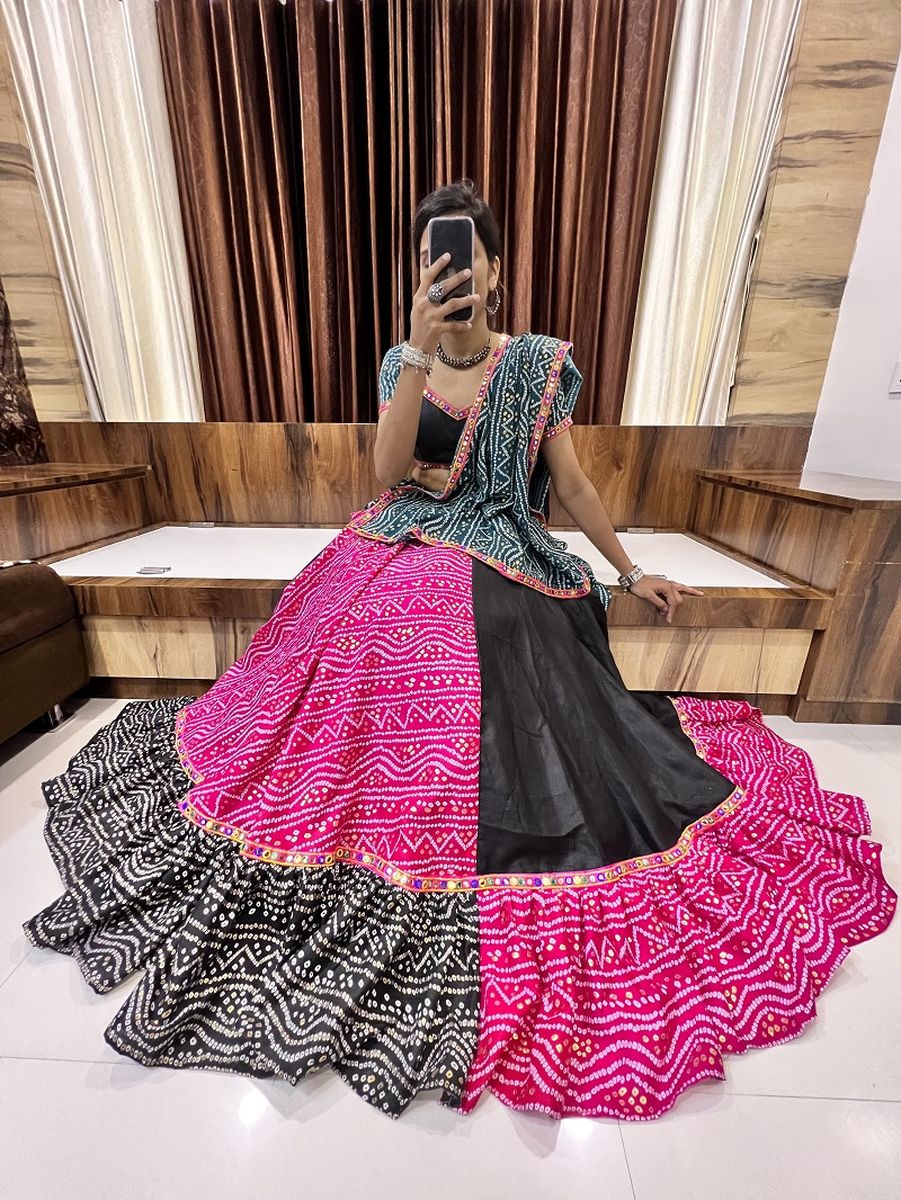 Pink and black color pure cotton silk printed lehenga with Gamthi, lacework, and mirror work detailing