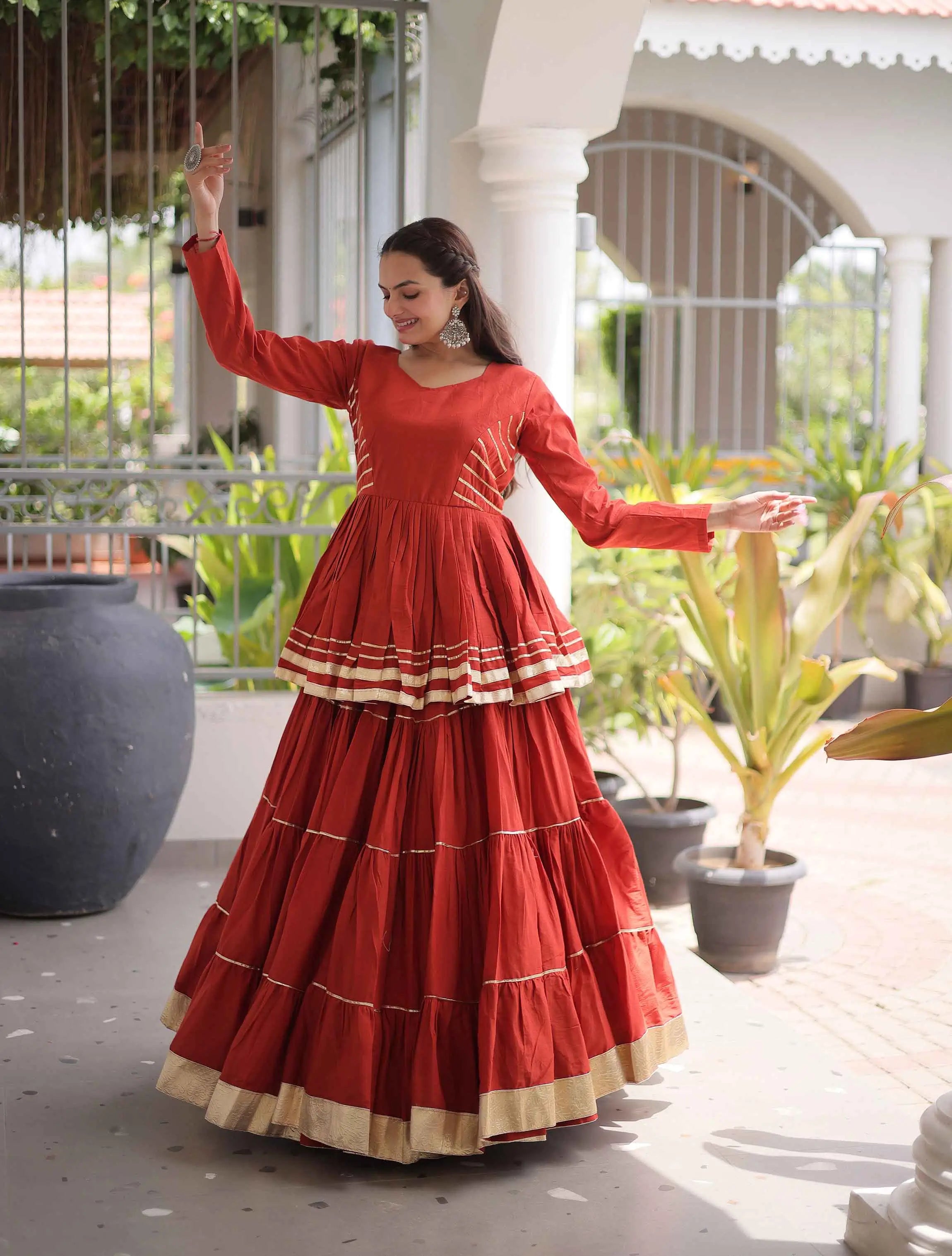 Rust Lehenga With Peplum Style Blouse