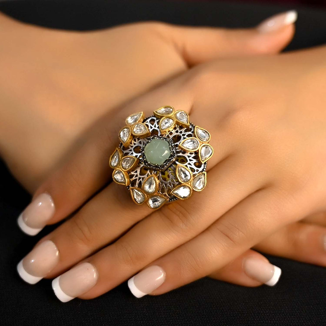 Hasina Mint Green Stone Gold Plated Boutique Ring on woman's hand, showcasing elegant design and luxurious appearance