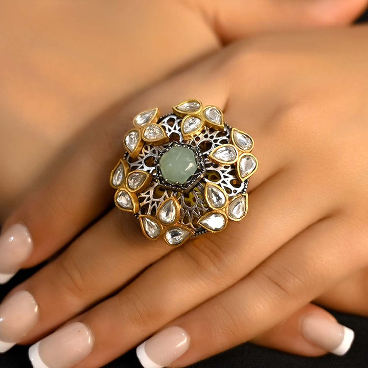 Close-up of Hasina Mint Green Stone Gold Plated Boutique Ring with intricate details and stunning green stone