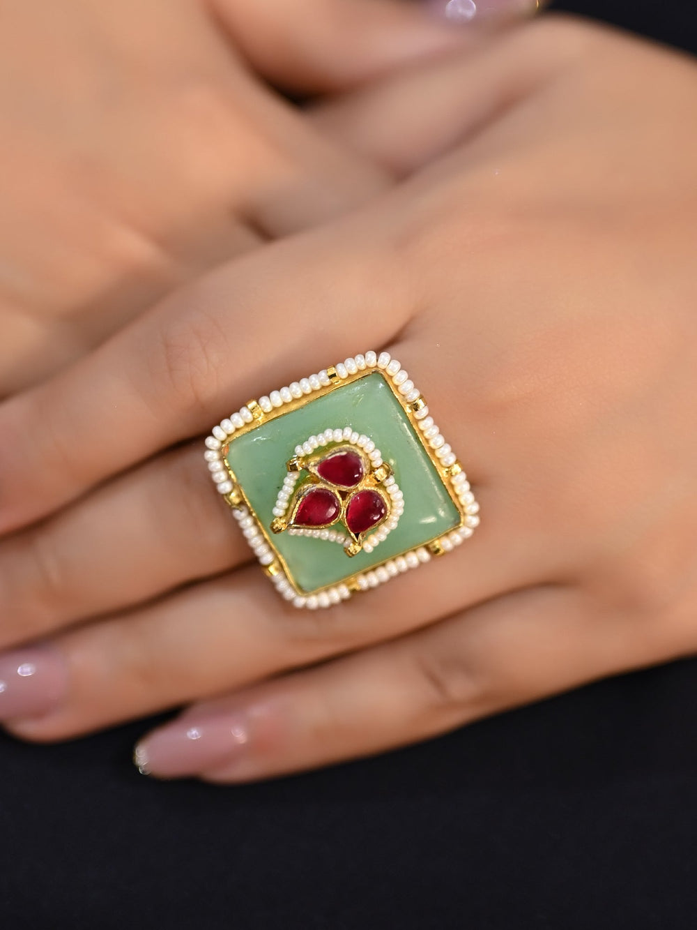 Beautiful Neeti Kundan finger ring with mint green stone, perfect for adding a touch of elegance to any outfit