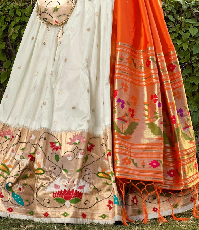 A stunning Jacquard Silk Paithani Lehenga Choli in White Color