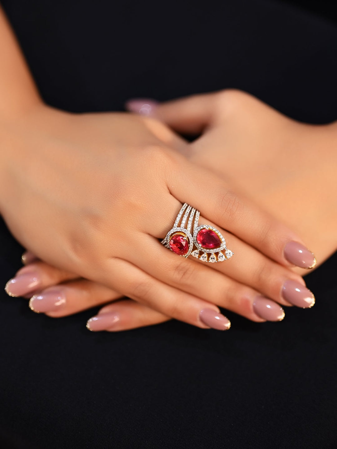 Narayani Ruby American Diamond Finger Ring with intricate floral design and sparkling red gemstone 