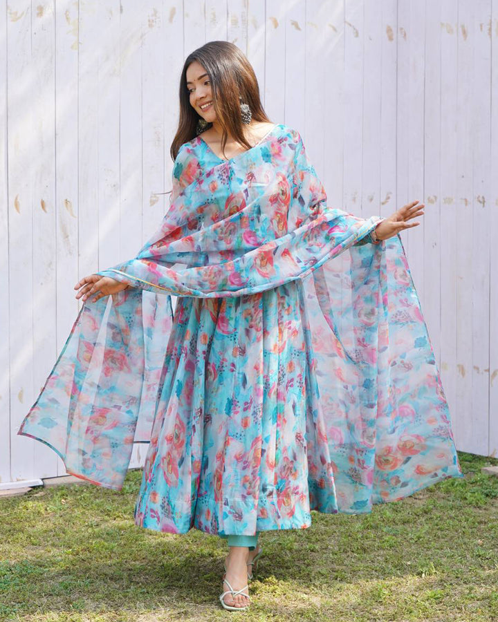 Sky Blue Multi Color Print Organza Three Piece Anarkali Suit by Qivii: a stunning traditional Indian outfit featuring a sky blue top with multi-color print, paired with matching pants and a sheer organza dupatta