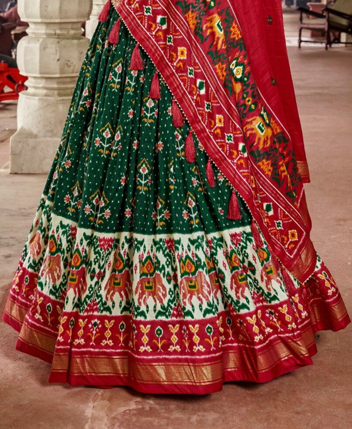 Tussar Silk Patola Print With Foil Work Lehenga Choli In Green Color