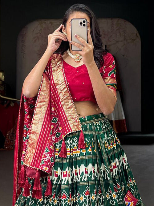 Tussar Silk Patola Print With Foil Work Lehenga Choli In Green Color