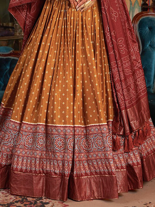 Dark orange Lehenga Choli with intricate Bandhani and Ajarakh print