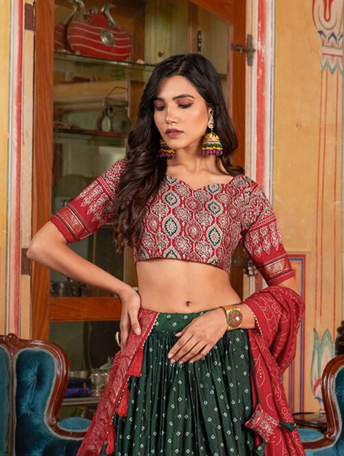 Bandhani And Ajarakh Print With Foil Work Lehenga Choli in Green Color, traditional Indian attire with intricate designs and beautiful embellishments