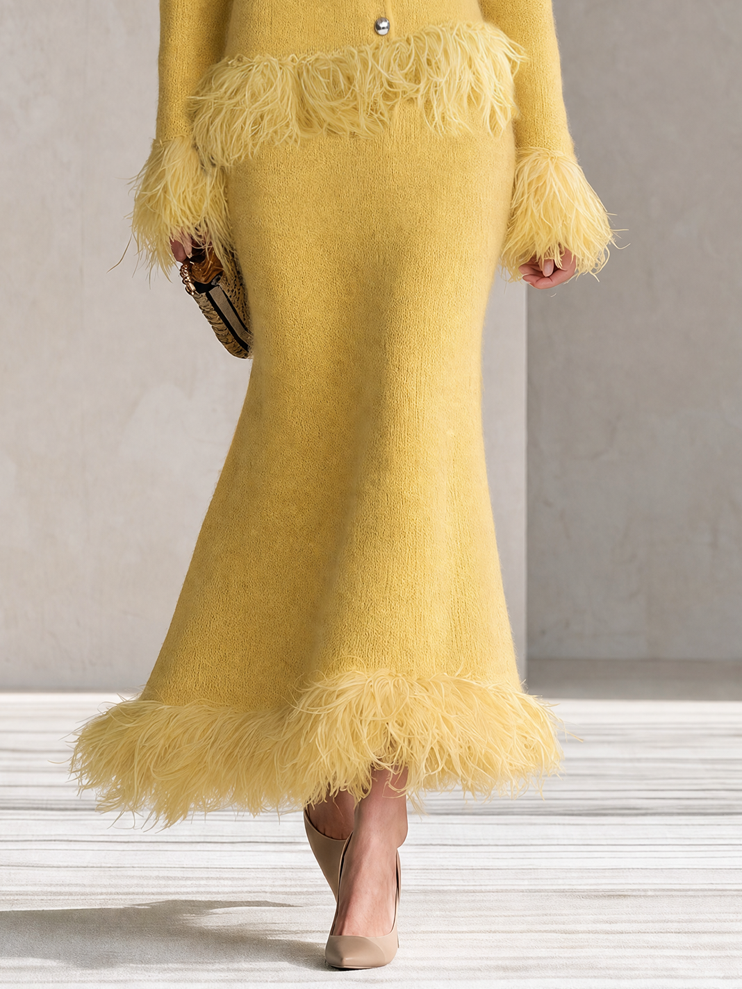 Oyrosy Clothing retro-chic yellow knitted skirt set with feather fringe details, women's fashion ensemble, stylish and cozy.