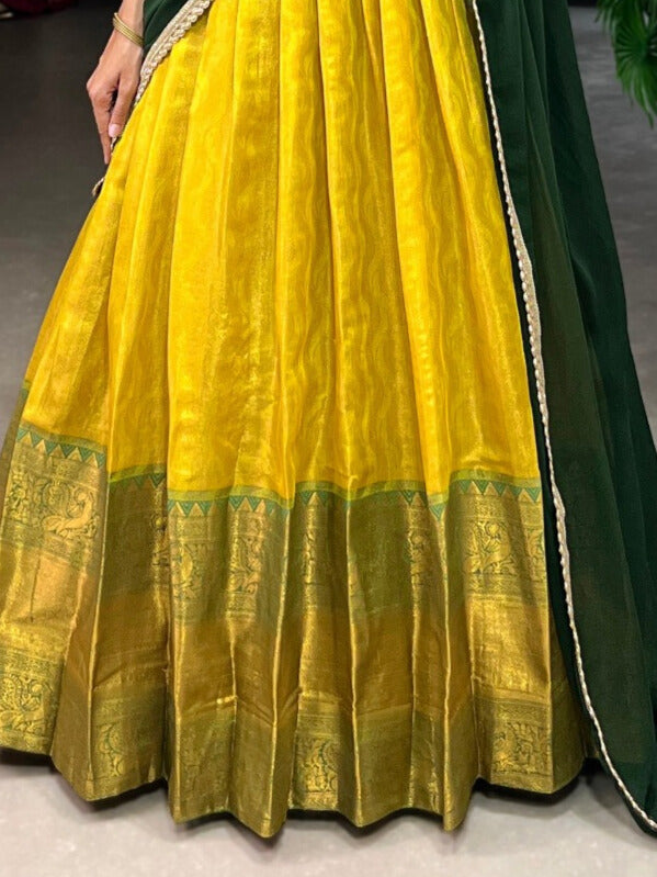 Tradition and Simplicity with our Kanjivaram Lehenga Choli and Georgette Dupatta In Yellow Color