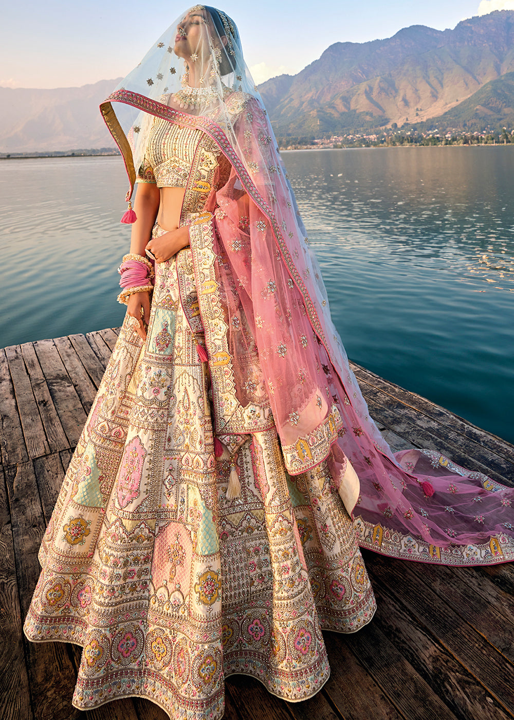 Elegant cream white lehenga choli with intricate embroidery details