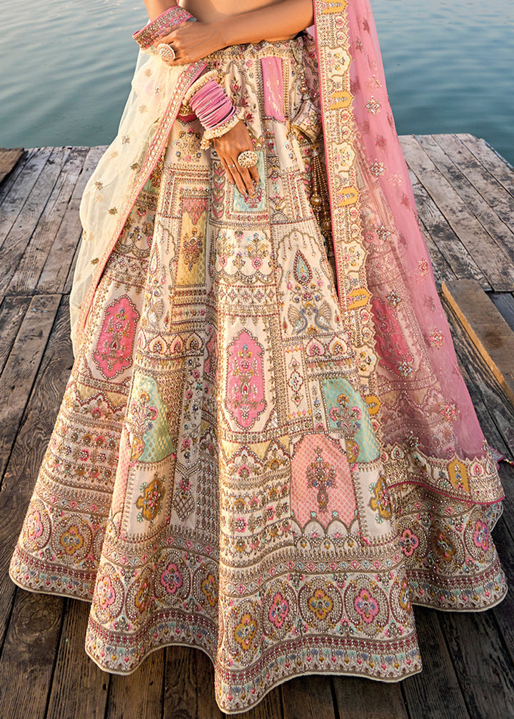 Opulent cream white Banarasi silk bridal lehenga choli with detailed embroidery design