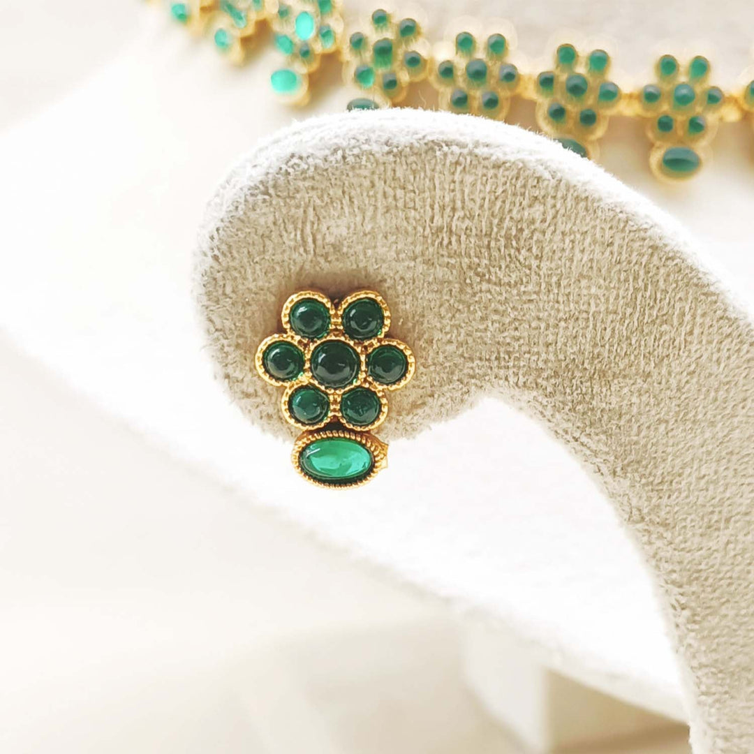 Traditional gold plated necklace set with intricate green stone details