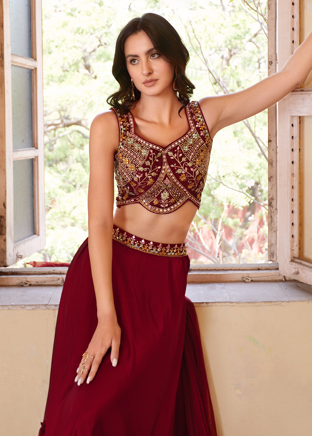 Fashionable maroon crop top style lehenga choli for weddings and special occasions