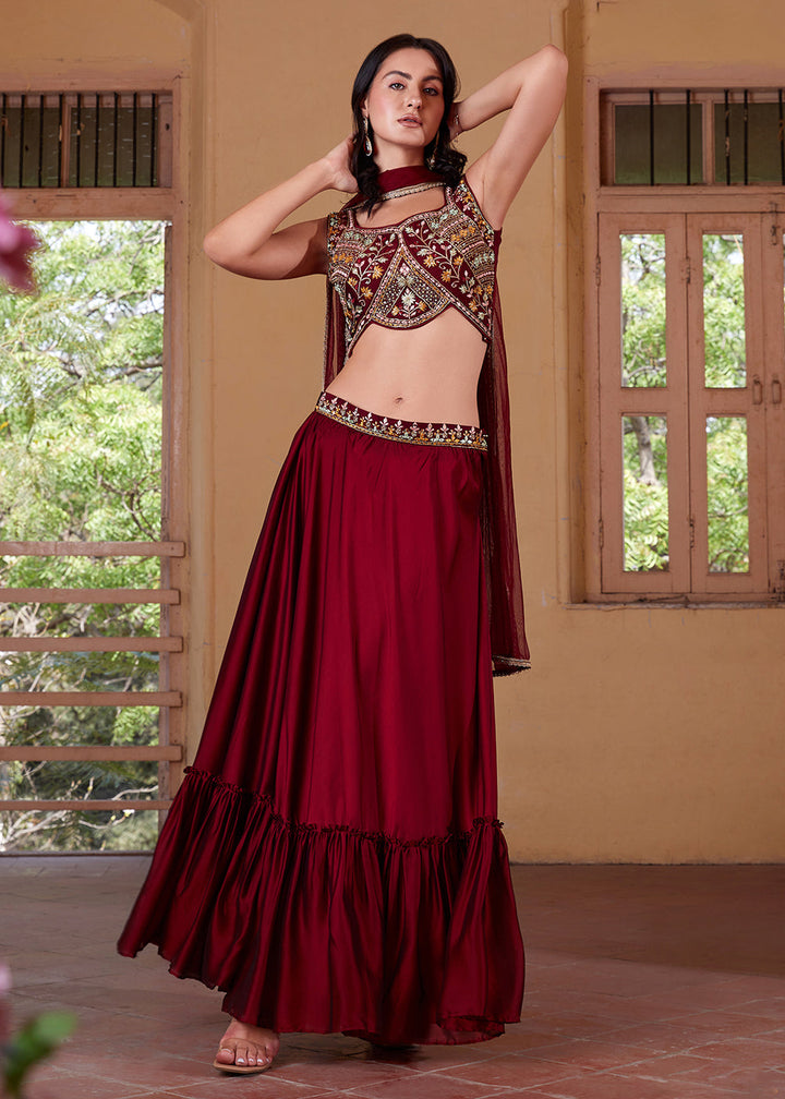 Exquisite maroon lehenga choli featuring intricate design and stunning craftsmanship