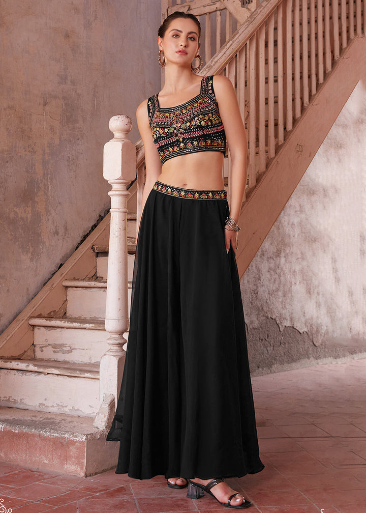 Beautifully designed black crop top and sharara suit for a stunning traditional outfit