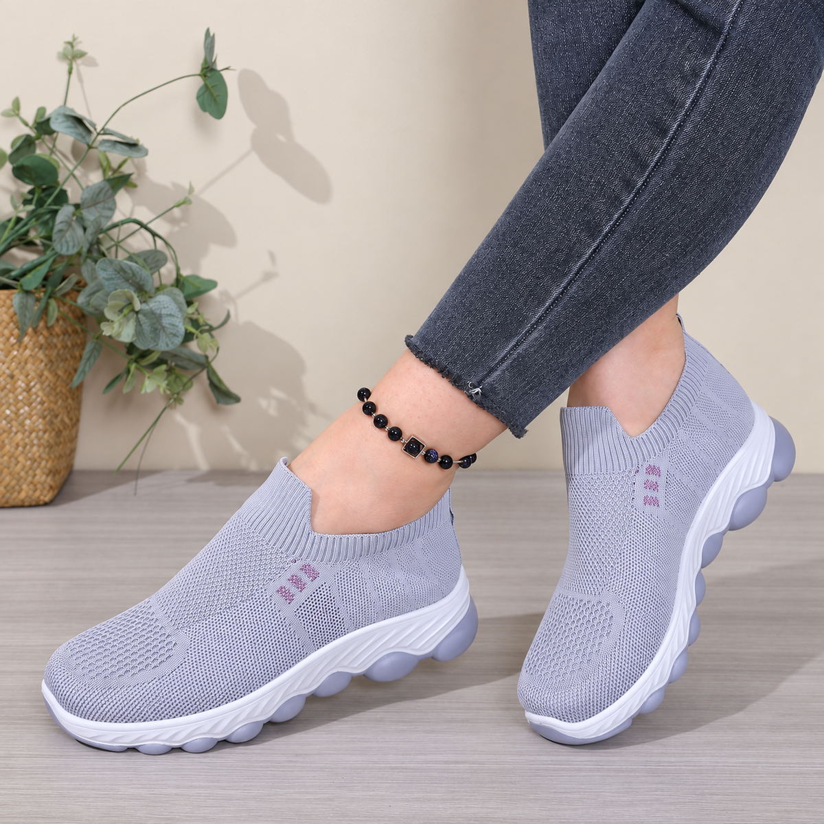 Gray women's Avenleigh knit slip-on sneakers by Bootara with breathable mesh, round toe, casual design, available in US sizes 5 to 10.5.