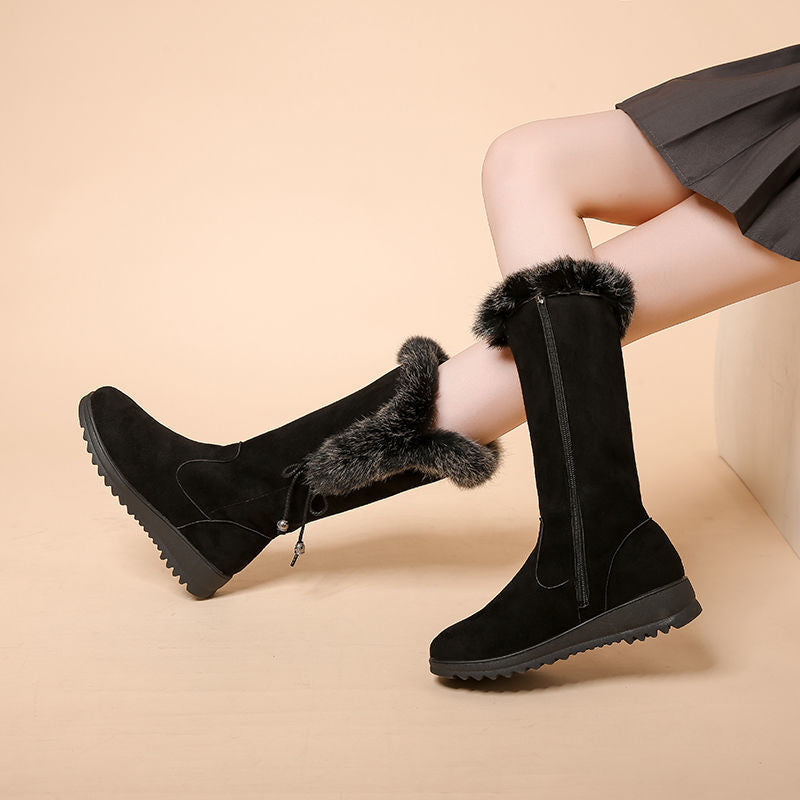 Black women's Elowick tall winter boots by Bootara with fur cuff, side zipper, and wedge lug sole, available in US sizes 4-9.
