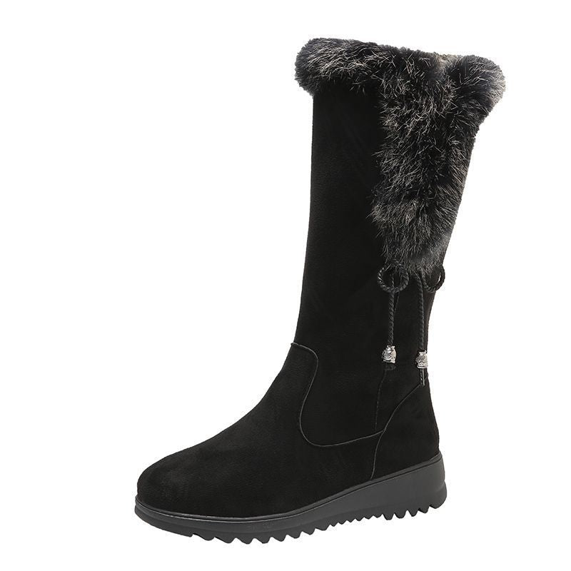 Black women's Elowick winter boots by Bootara with fur cuff, side zip, and wedge lug sole, available in US sizes 4 to 9.