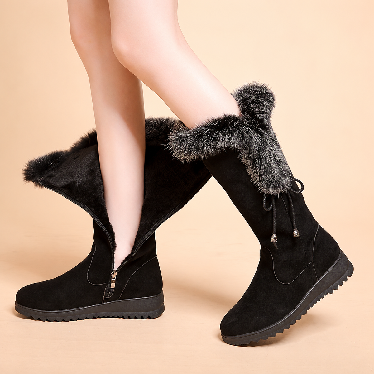 Black Women's Elowick winter boots by Bootara with fur cuff, side zipper, and wedge lug sole, size US 4-9.
