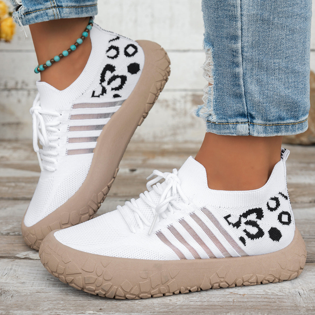 Women's Cerynna Knit Sneakers by Bootara featuring leopard detail, slip-on style, chunky sole, in white with US sizes 5-10.5