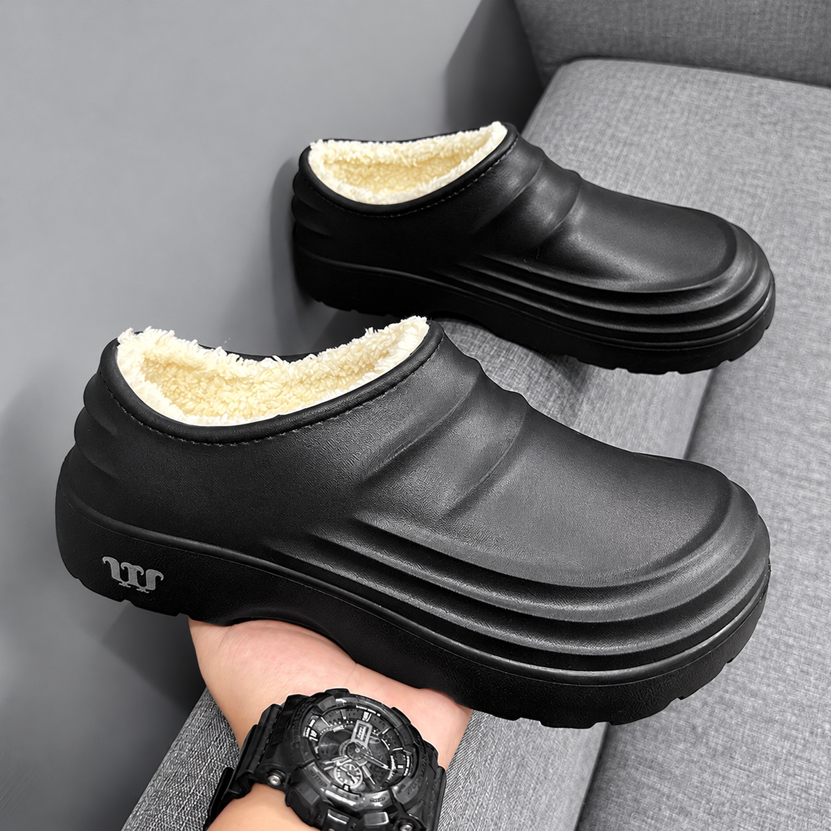 Black Women's Rovelle Plush Lined Clogs by Bootara, closed-back slip-on shoes with sculpted EVA sole, available in US sizes 5-11.
