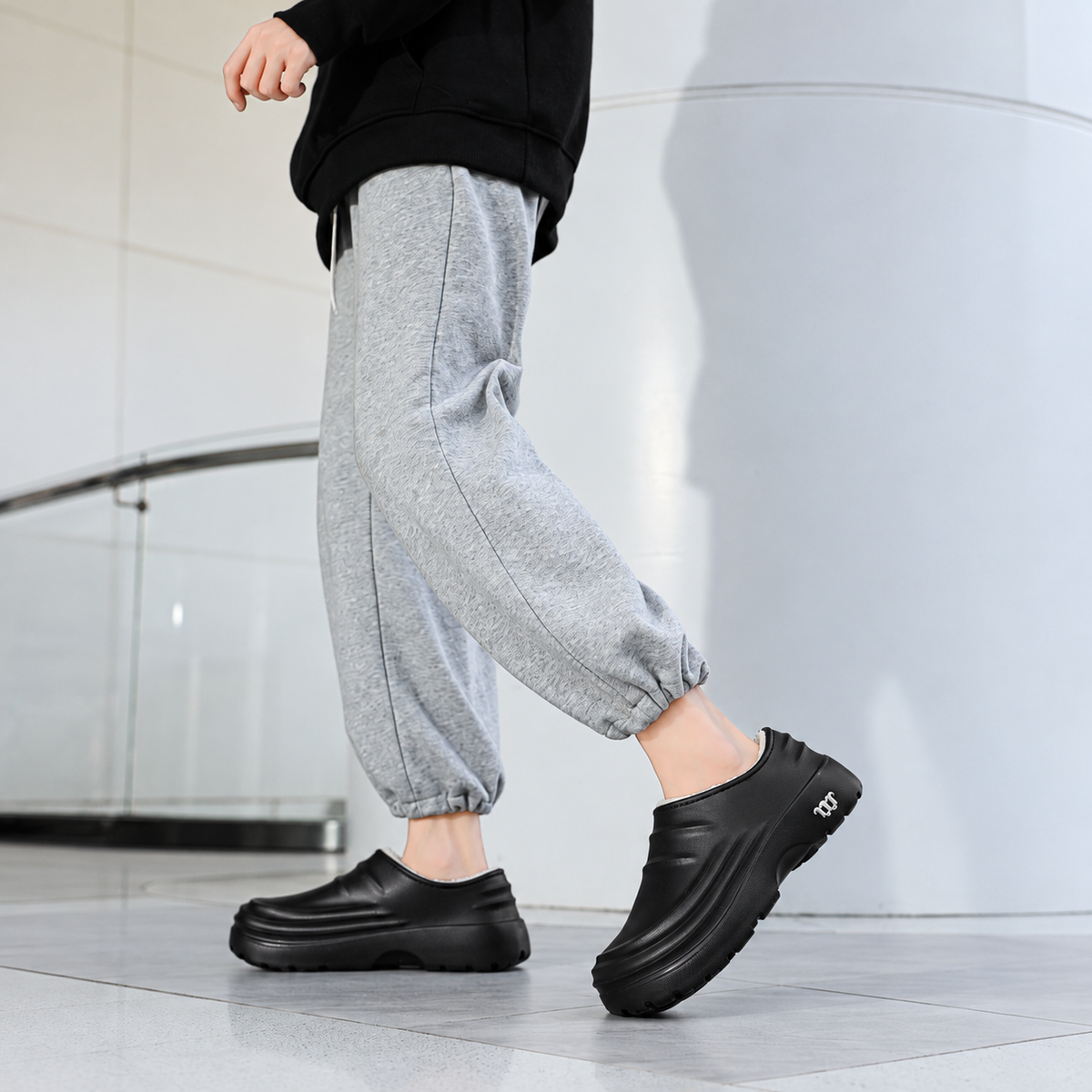 Women's Rovelle plush-lined black slip-on clogs with closed back and sculpted EVA sole by Bootara, available in US sizes 5-11.