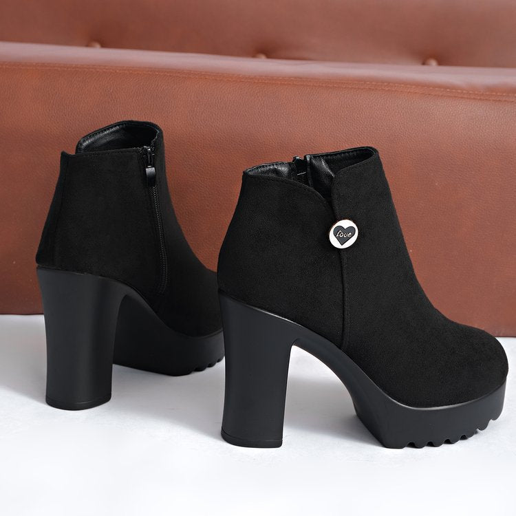 Black women's Veylisse platform ankle boots by Bootara with round toe, side zipper, heart detail, and high block heel.