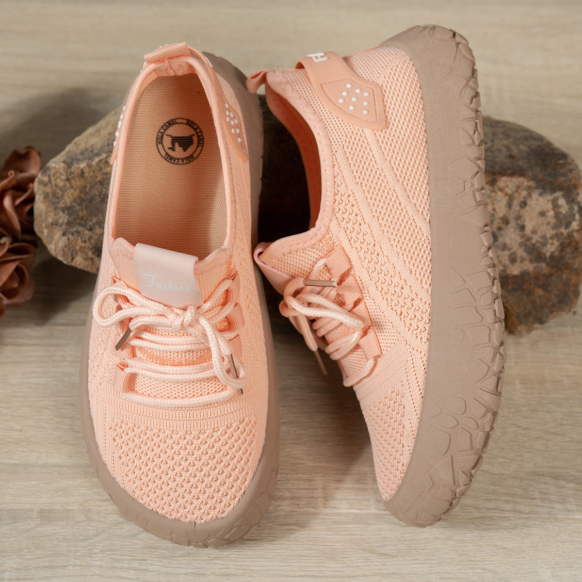 Women's Thessalie Knit Sneakers by Bootara in orange, breathable slip-on shoes with laces and textured chunky sole.