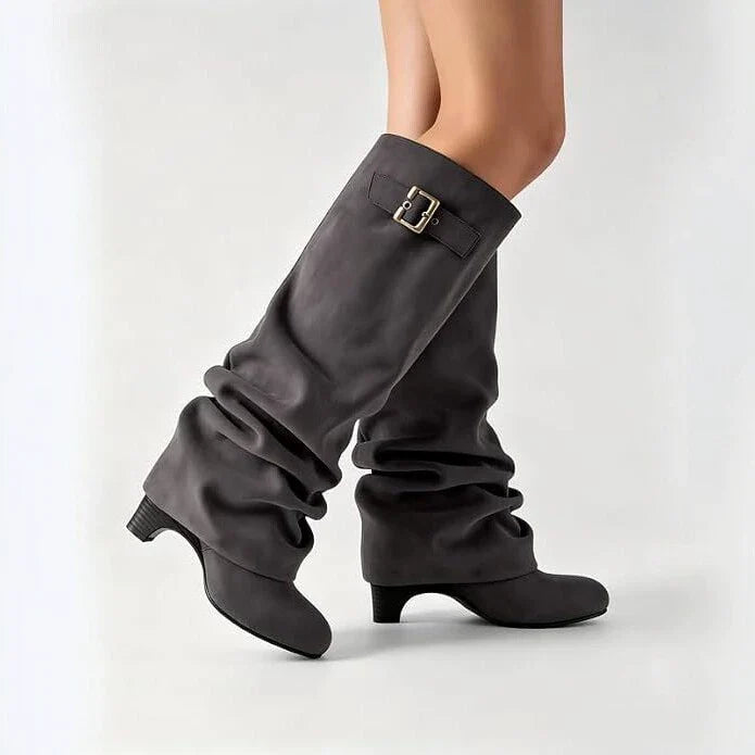 Dark gray women's Velmorie slouch knee-high boots by Bootara with buckle details, round toe, suede-look finish, available in US sizes 4-10.5.