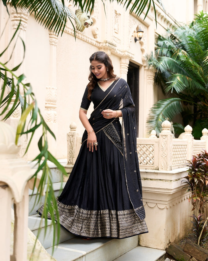 Elegant black lehenga with intricate zari weaving border