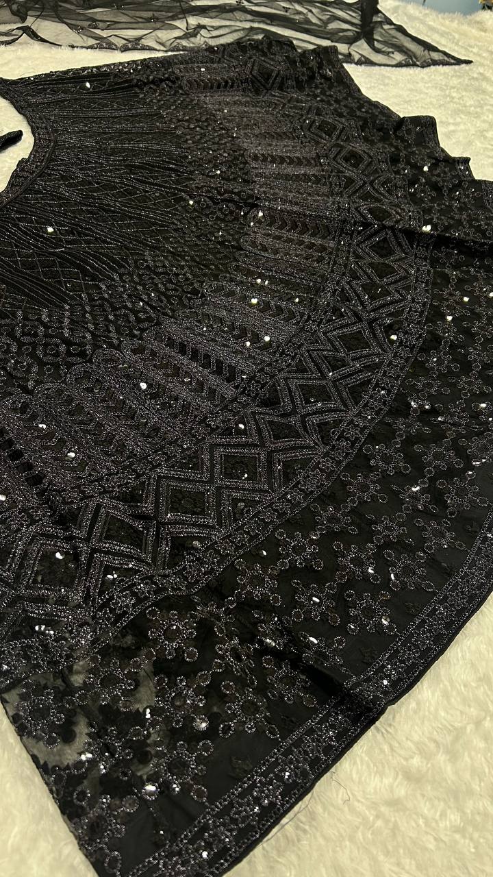 Exquisite Black Net lehnga featuring intricate dori and sequins work, a perfect blend of elegance and craftsmanship - INSPIRED