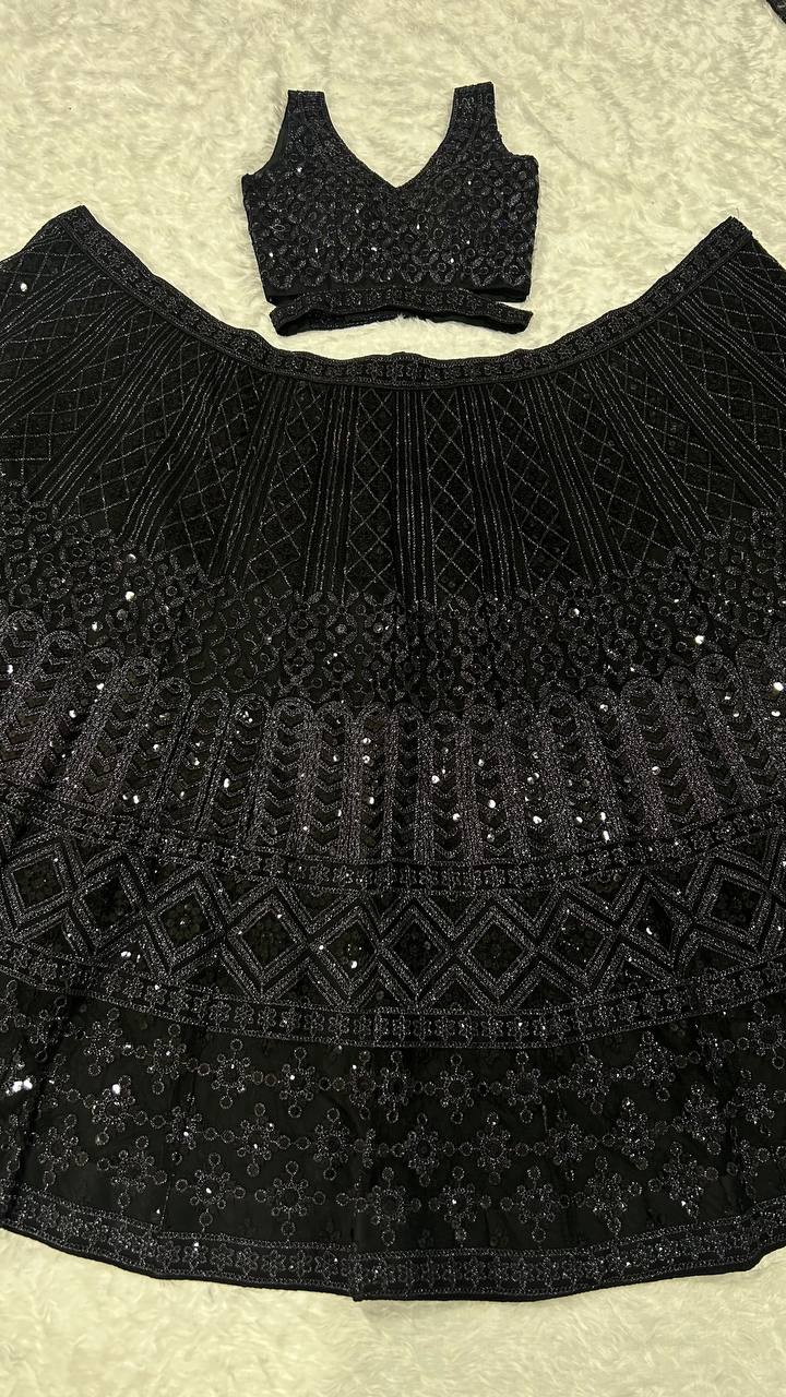 Beautiful black net lehenga featuring intricate dori and sequins work