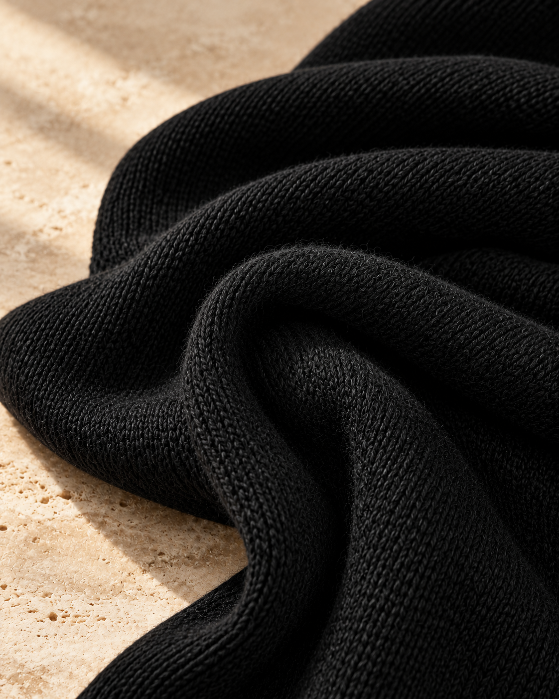 Women's black knitted turtleneck midi dress by Modesees, long-sleeved, loose fit, elegant and cozy for stylish winter wear.