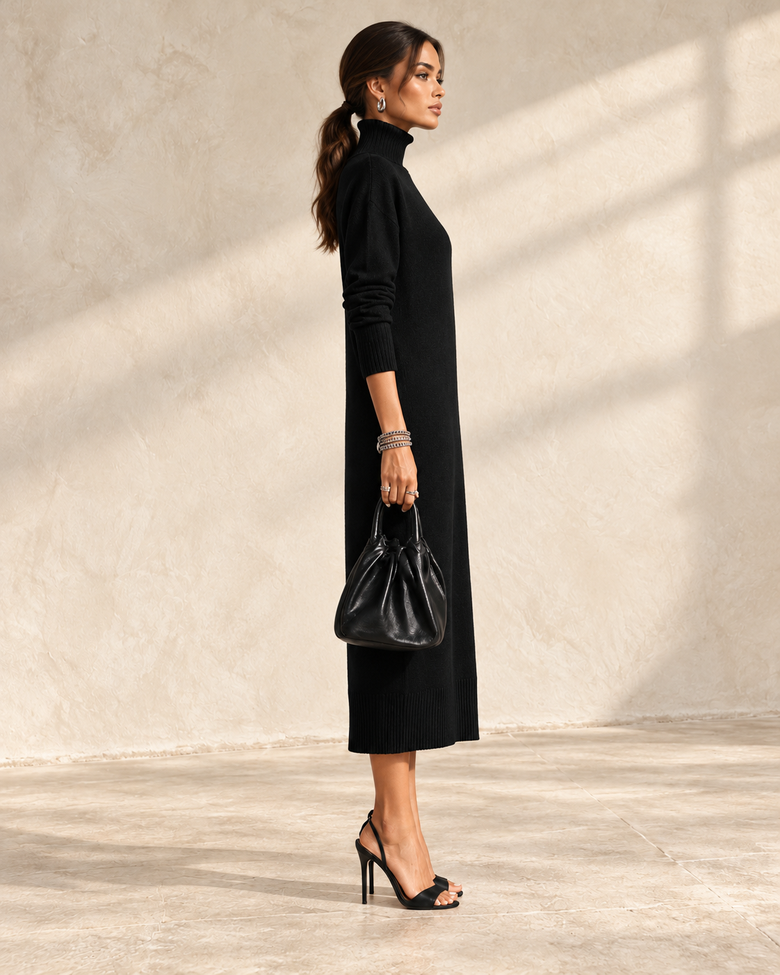 Elegant black knitted turtleneck midi dress for women by Modesees, long-sleeved, loose fit, no pockets, stylish and comfortable wear.