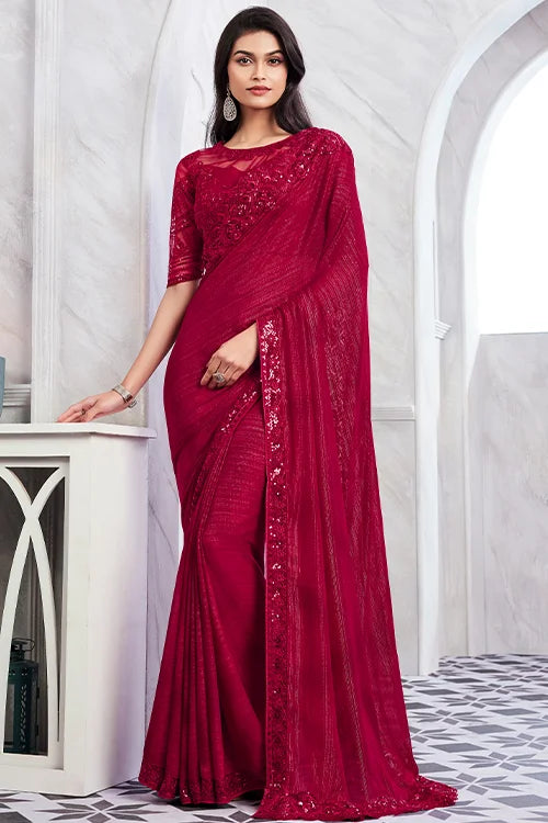 Beautiful cherry red blouse paired with intricate woven saree from designer wedding collection