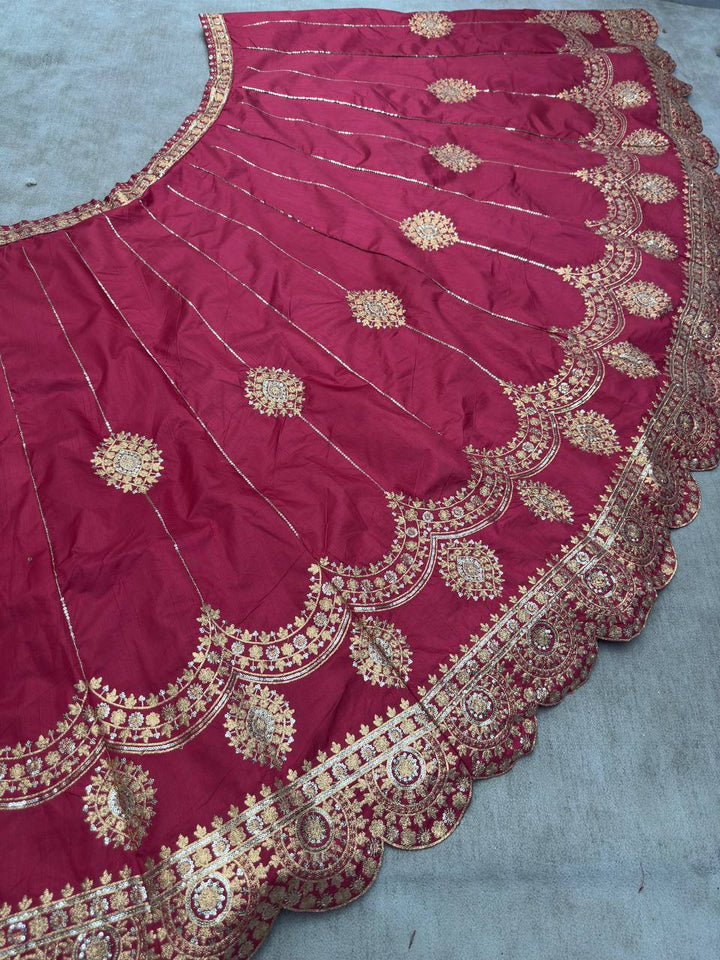 Maroon color Jalpari silk saree with intricate embroidery, sequence and zari design work inspired by traditional Indian craftsmanship