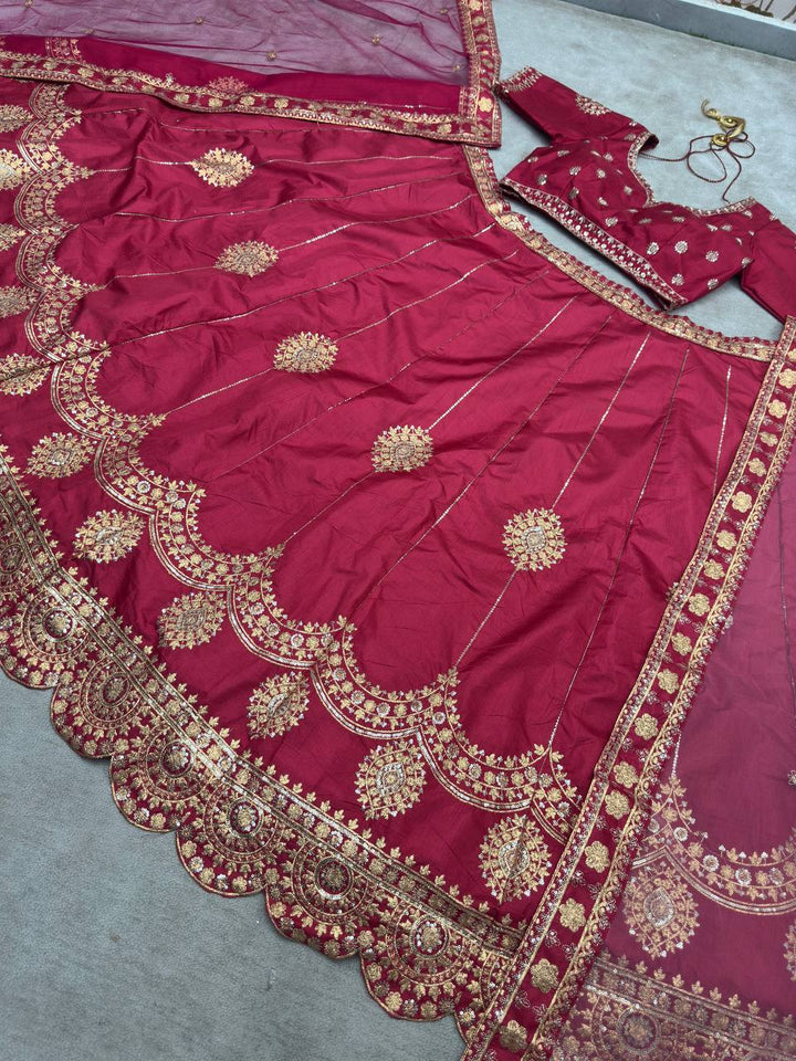 Maroon color silk fabric with intricate embroidery and zari design work inspired by traditional Jalpari motifs