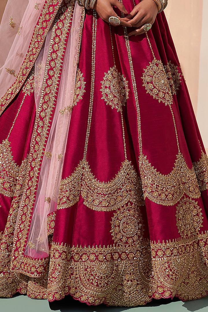 Maroon color Jalpari silk saree with intricate embroidery sequence and zari design work inspired by traditional craftsmanship and rich cultural heritage