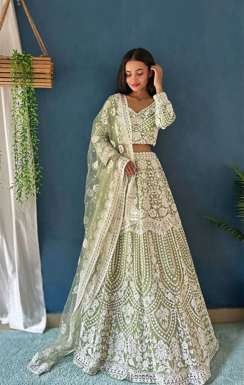 Beautiful green heavy net designer lehenga with pure bitts pearl work