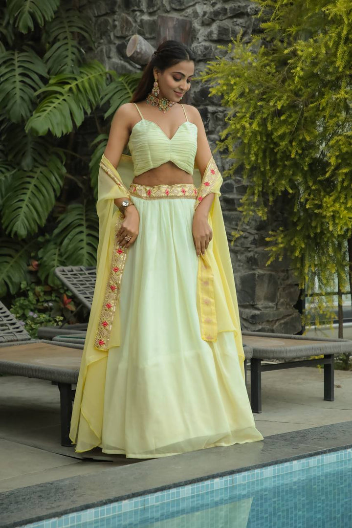 Yellow Color Georgette lehenga with thread , Dori & sequins work on waist border