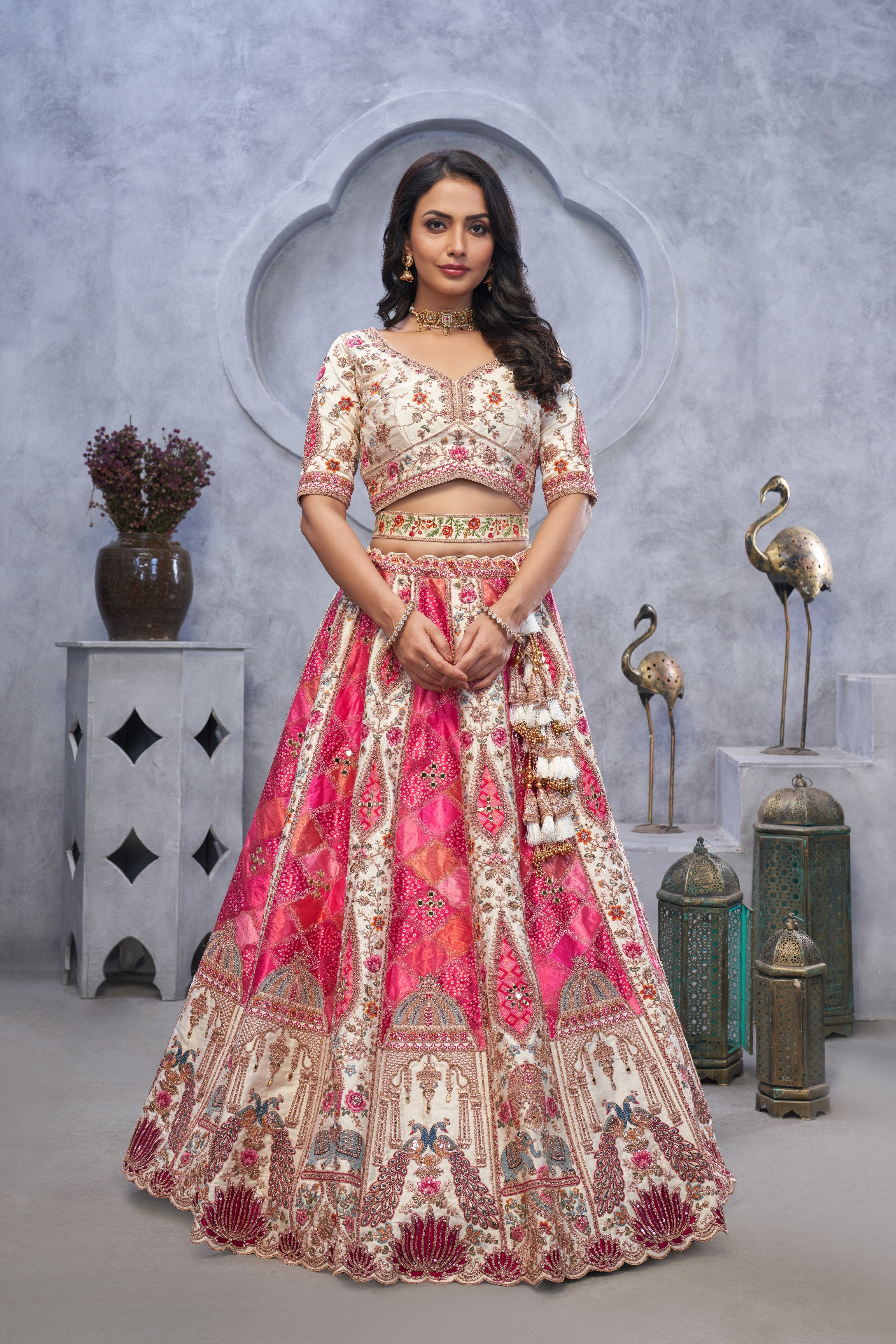 Bridal Lehenga with Temple Motifs, Peacock Embroidery & Bandhej Jacquard Patches - qivii